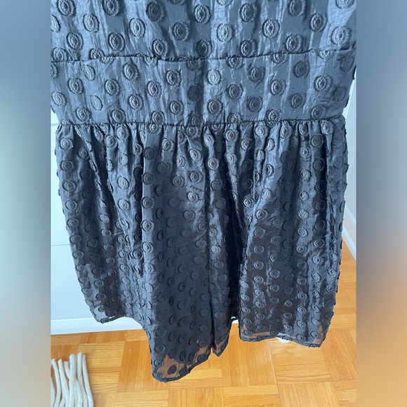 Revolve Majorelle Walsh Puff Sleeve Romper
Size XS Black Deep V-Neck Swiss Dot - Picture 10 of 10